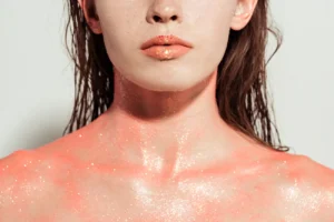 cropped view of nude woman with coral glitter and 2023 11 27 05 10 01 utc